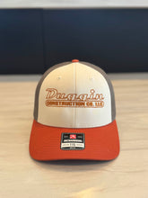 Tan, Brown, and Red Cap